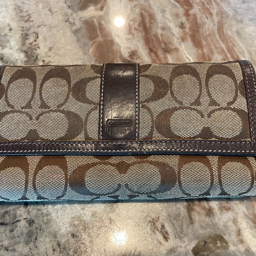 Coach brown monogram tri fold wallet